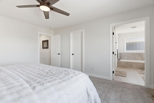 117 Ranchers View, Okotoks, AB - Indoor Photo Showing Bedroom
