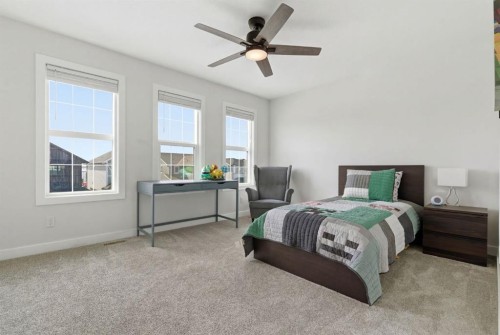 117 Ranchers View, Okotoks, AB - Indoor Photo Showing Bedroom