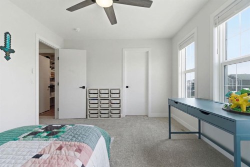 117 Ranchers View, Okotoks, AB - Indoor Photo Showing Bedroom
