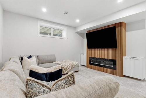 117 Ranchers View, Okotoks, AB - Indoor With Fireplace