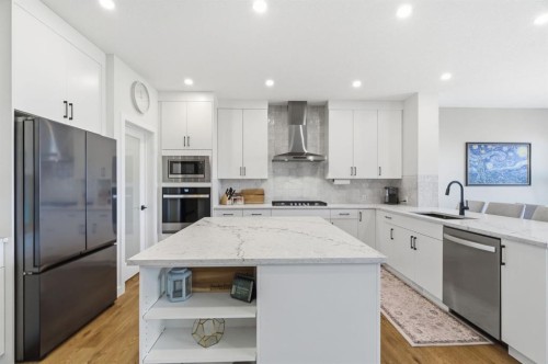 117 Ranchers View, Okotoks, AB - Indoor Photo Showing Kitchen With Stainless Steel Kitchen With Upgraded Kitchen