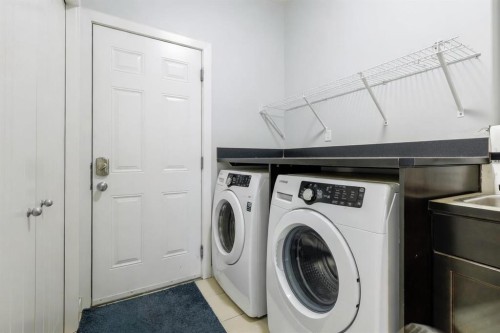 16 Redstone Parade Ne, Calgary, AB - Indoor Photo Showing Laundry Room