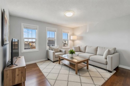 16 Redstone Parade Ne, Calgary, AB - Indoor Photo Showing Living Room