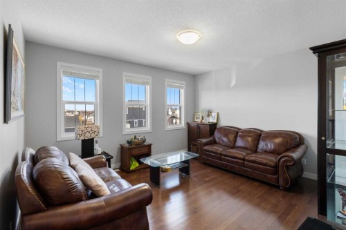16 Redstone Parade Ne, Calgary, AB - Indoor Photo Showing Living Room