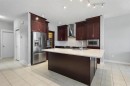 16 Redstone Parade Ne, Calgary, AB  - Indoor Photo Showing Kitchen With Stainless Steel Kitchen With Upgraded Kitchen 