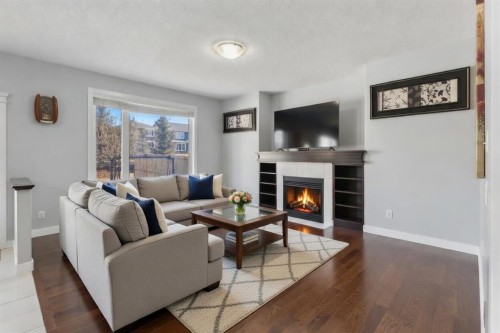 16 Redstone Parade Ne, Calgary, AB - Indoor Photo Showing Living Room With Fireplace