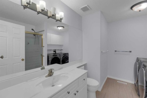 2-200 Sandstone Drive Nw, Calgary, AB - Indoor Photo Showing Laundry Room