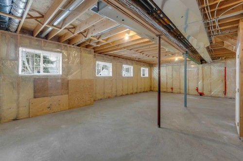 2-200 Sandstone Drive Nw, Calgary, AB - Indoor Photo Showing Basement