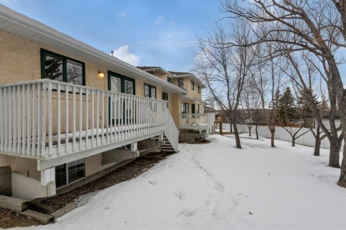 2-200 Sandstone Drive Nw, Calgary, AB - Outdoor With Deck Patio Veranda