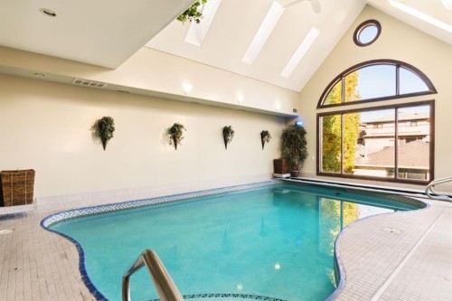 2248 9 Avenue Se, Calgary, AB - Indoor Photo Showing Other Room With In Ground Pool