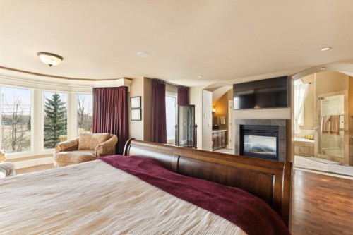 2248 9 Avenue Se, Calgary, AB - Indoor Photo Showing Bedroom With Fireplace