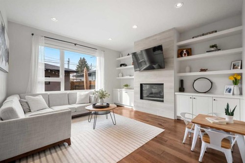 3917 2 Street Nw, Calgary, AB - Indoor Photo Showing Living Room With Fireplace