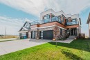 424 Watercrest Place, Chestermere, AB  - Outdoor With Balcony With Facade 