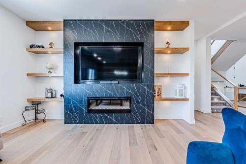 424 Watercrest Place, Chestermere, AB - Indoor Photo Showing Living Room With Fireplace