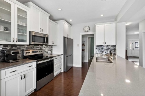 14 Evansfield Road Nw, Calgary, AB - Indoor Photo Showing Kitchen With Stainless Steel Kitchen With Double Sink With Upgraded Kitchen