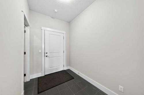 14 Evansfield Road Nw, Calgary, AB - Indoor Photo Showing Other Room