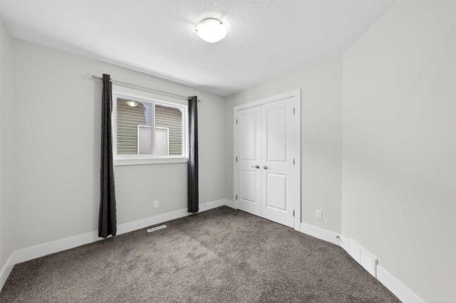 14 Evansfield Road Nw, Calgary, AB - Indoor Photo Showing Other Room