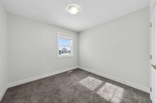 14 Evansfield Road Nw, Calgary, AB - Indoor Photo Showing Other Room