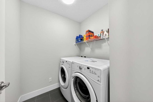 14 Evansfield Road Nw, Calgary, AB - Indoor Photo Showing Laundry Room