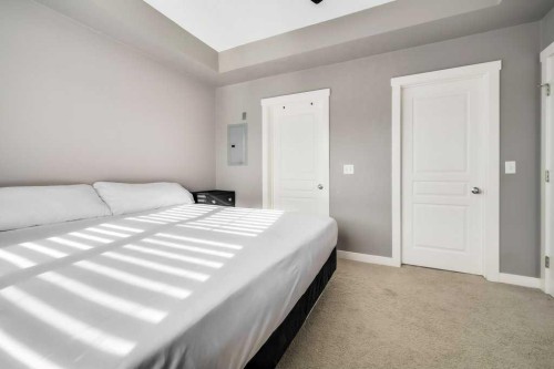160 Cranford Walk Se, Calgary, AB - Indoor Photo Showing Bedroom