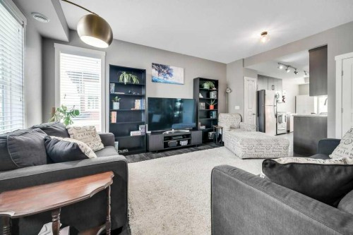 160 Cranford Walk Se, Calgary, AB - Indoor Photo Showing Living Room
