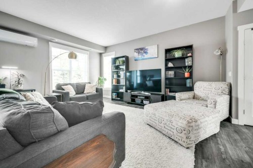 160 Cranford Walk Se, Calgary, AB - Indoor Photo Showing Living Room
