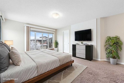 220 Walden Heights Se, Calgary, AB - Indoor Photo Showing Bedroom