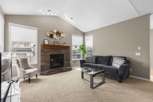 196 Kincora Hill Nw, Calgary, AB - Indoor Photo Showing Living Room With Fireplace