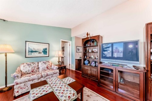 151 Macewan Ridge Villas Nw, Calgary, AB - Indoor Photo Showing Living Room