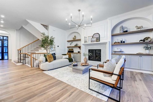 3207 Alfege Street Sw, Calgary, AB - Indoor Photo Showing Living Room With Fireplace