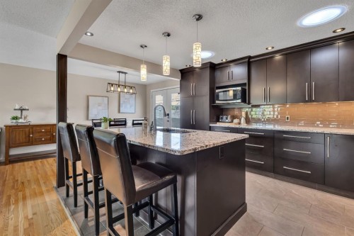 335 Huntbourne Hill Ne, Calgary, AB - Indoor Photo Showing Kitchen With Upgraded Kitchen