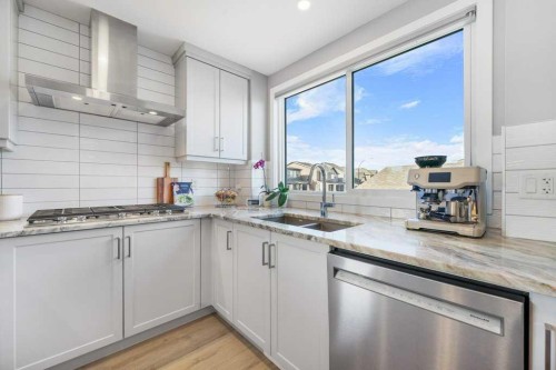 37 Legacy Glen Link Se, Calgary, AB - Indoor Photo Showing Kitchen With Double Sink With Upgraded Kitchen