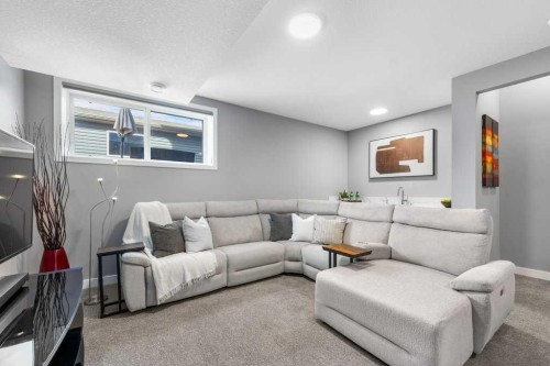 37 Legacy Glen Link Se, Calgary, AB - Indoor Photo Showing Living Room