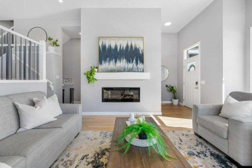 37 Legacy Glen Link Se, Calgary, AB - Indoor Photo Showing Living Room With Fireplace