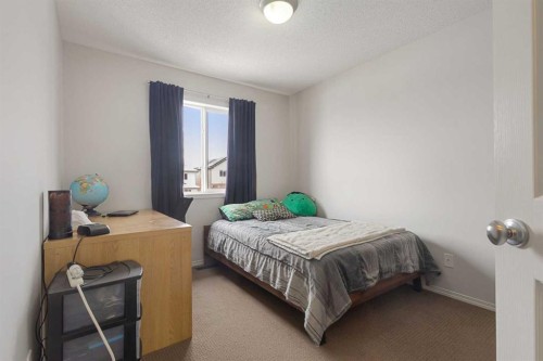 41 Silverado Saddle Avenue Sw, Calgary, AB - Indoor Photo Showing Bedroom