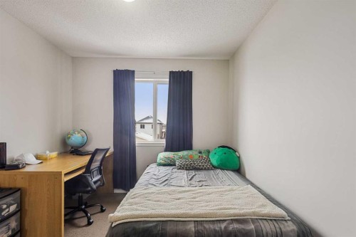 41 Silverado Saddle Avenue Sw, Calgary, AB - Indoor Photo Showing Bedroom