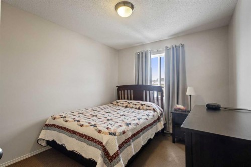 41 Silverado Saddle Avenue Sw, Calgary, AB - Indoor Photo Showing Bedroom