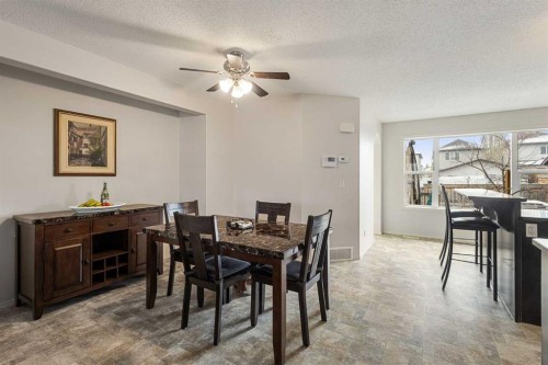 41 Silverado Saddle Avenue Sw, Calgary, AB - Indoor Photo Showing Dining Room