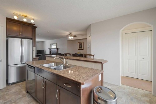 41 Silverado Saddle Avenue Sw, Calgary, AB - Indoor Photo Showing Kitchen With Double Sink