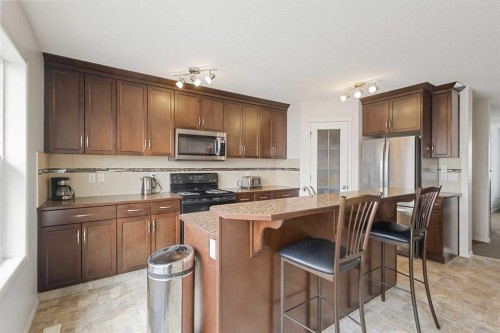 41 Silverado Saddle Avenue Sw, Calgary, AB - Indoor Photo Showing Kitchen