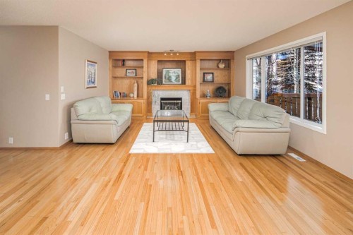 110 Hampstead Rise Nw, Calgary, AB - Indoor Photo Showing Living Room With Fireplace