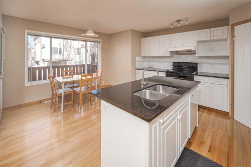 110 Hampstead Rise Nw, Calgary, AB - Indoor Photo Showing Kitchen With Double Sink