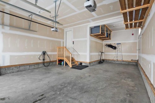 86 Juneberry Heights, Rural Rocky View County, AB - Indoor Photo Showing Garage