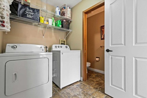 32 Millrise Crescent Sw, Calgary, AB - Indoor Photo Showing Laundry Room