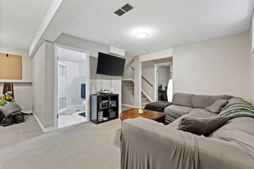 32 Millrise Crescent Sw, Calgary, AB - Indoor Photo Showing Living Room