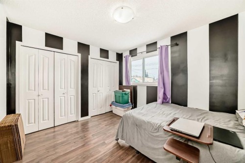 118 Dovertree Place Se, Calgary, AB - Indoor Photo Showing Bedroom