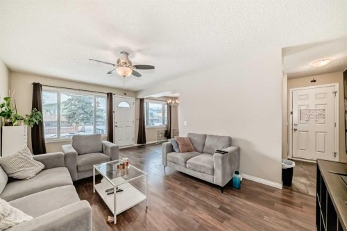 118 Dovertree Place Se, Calgary, AB - Indoor Photo Showing Living Room