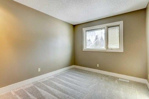 20 Strathlorne Crescent Sw, Calgary, AB - Indoor Photo Showing Other Room