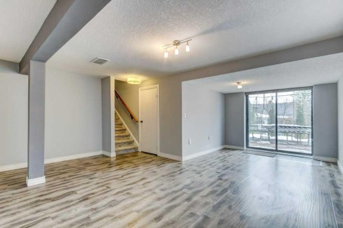 20 Strathlorne Crescent Sw, Calgary, AB - Indoor Photo Showing Other Room