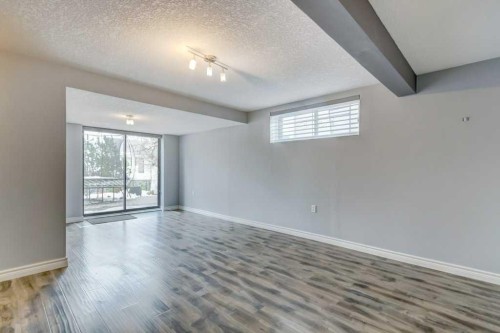 20 Strathlorne Crescent Sw, Calgary, AB - Indoor Photo Showing Other Room